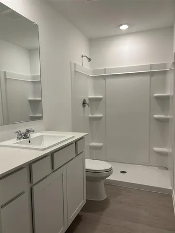 a view of backyard with tub