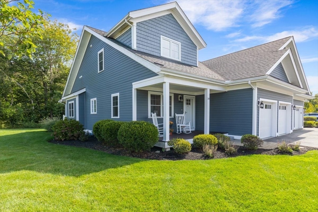 14 Longwood Lane, Unit 14 Hanover, MA 02339 - Photo 1 of 42 a view of a house with a yard and plants