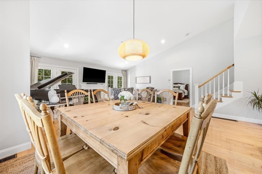 14 Longwood Lane, Unit 14 Hanover, MA 02339 - Photo 11 of 42 a view of a dining table and chairs