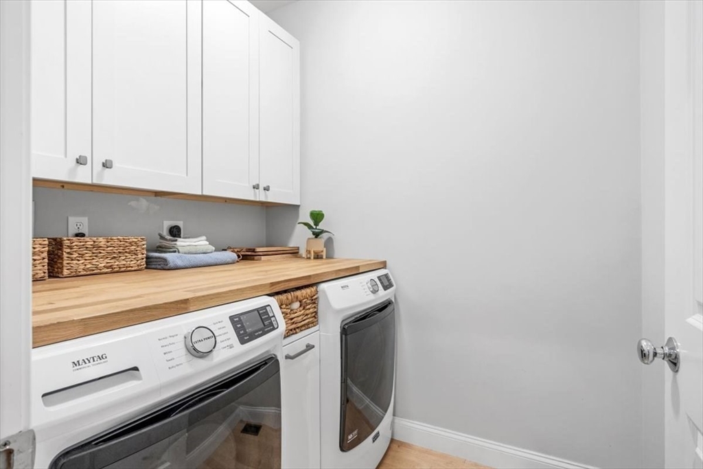 14 Longwood Lane, Unit 14 Hanover, MA 02339 - Photo 18 of 42 a view of washer and dryer