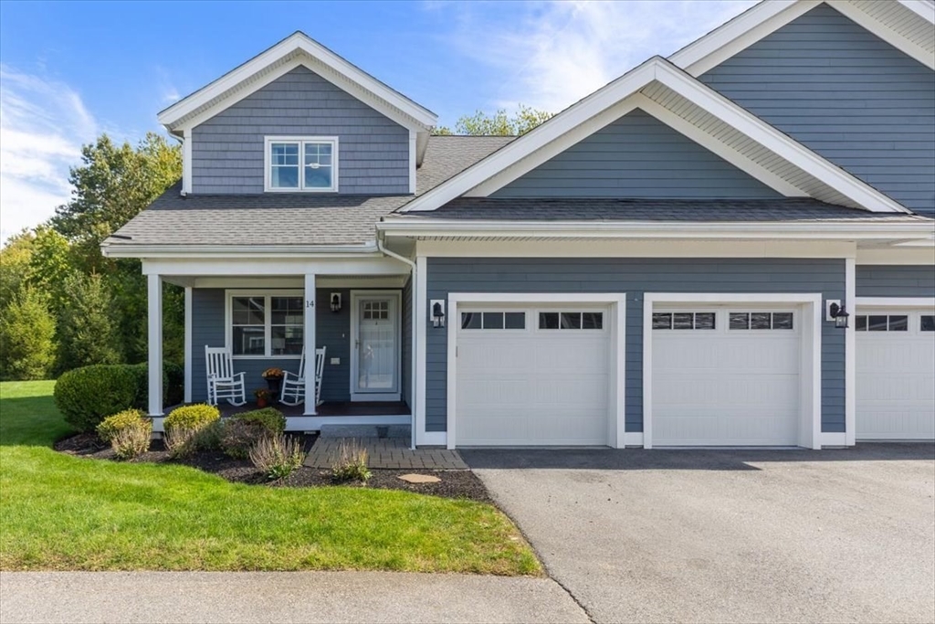 14 Longwood Lane, Unit 14 Hanover, MA 02339 - Photo 2 of 42 front view of a house with a yard
