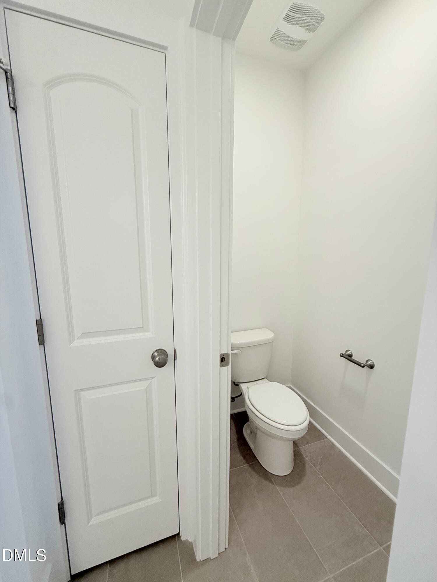 6906 Fire Tower Road Spring Hope, NC 27882 - Photo 25 of 32 a bathroom with a toilet