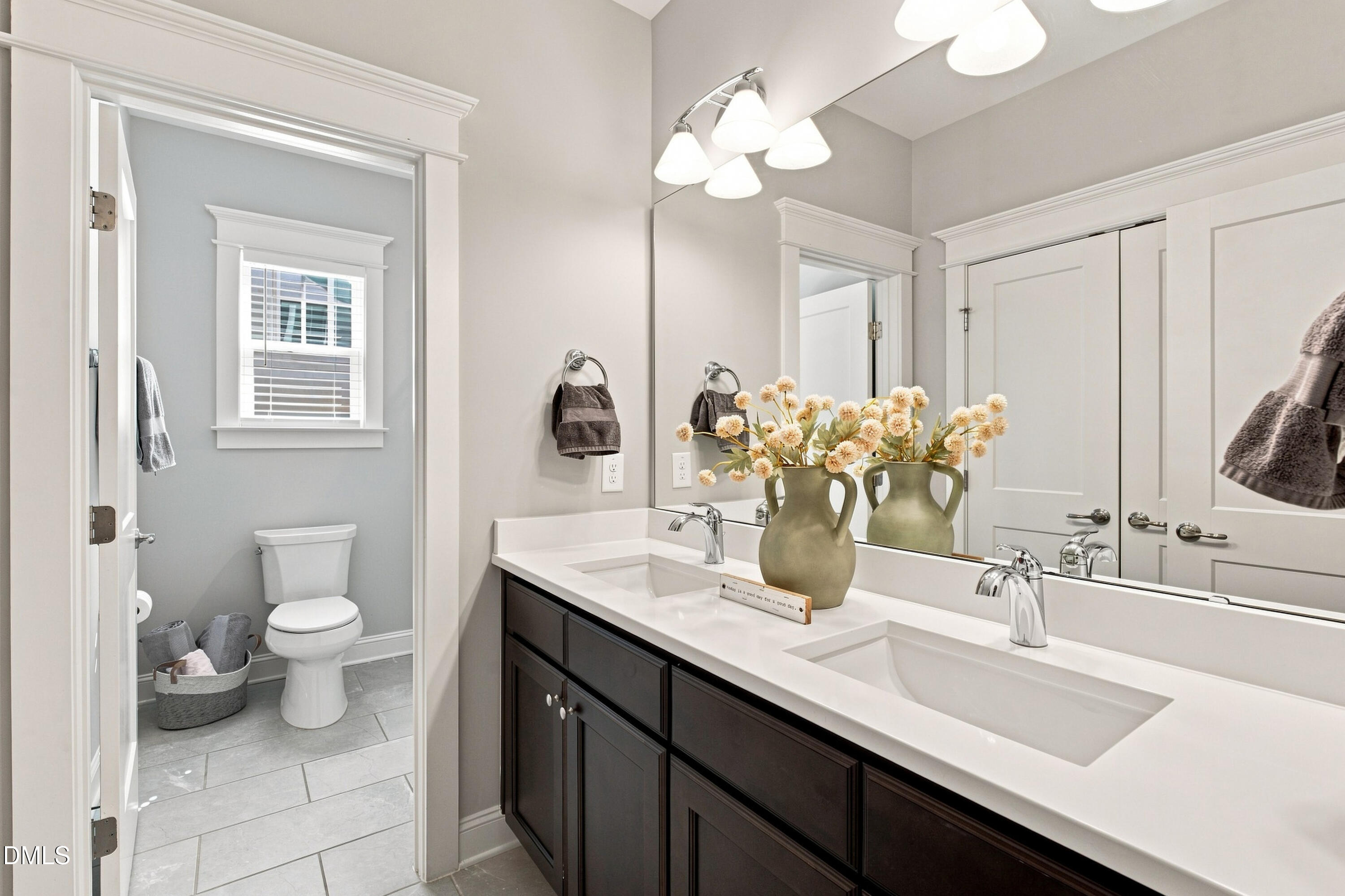 8021 Ghost Pony Trail Raleigh, NC 27613 - Photo 36 of 55 Second floor bathroom with double vanity