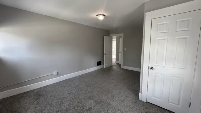 a bathroom with a bathtub and a toilet