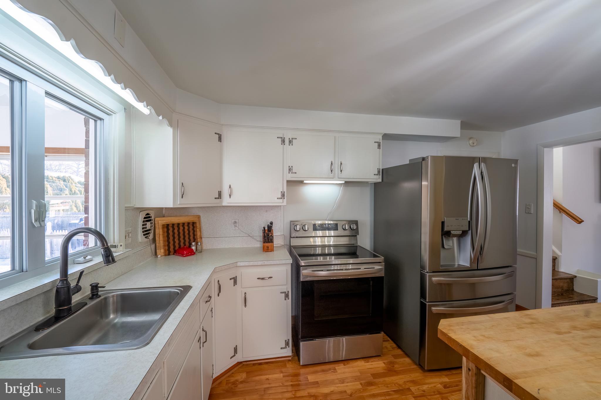 317 Lewis Road Springfield, PA 19064 - Photo 9 of 40 Freshly Painted White & Bright Kitchen