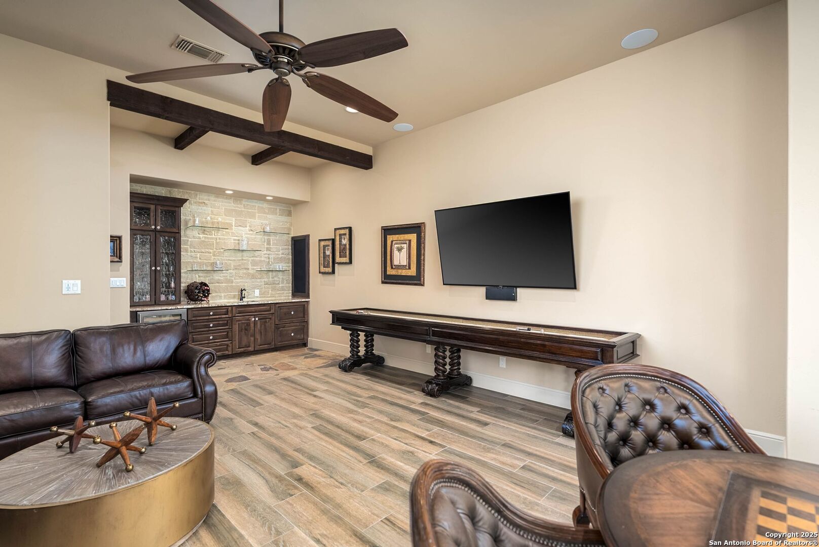 631 Menger Springs Boerne, TX 78006 - Photo 14 of 54 a living room with furniture and a flat screen tv