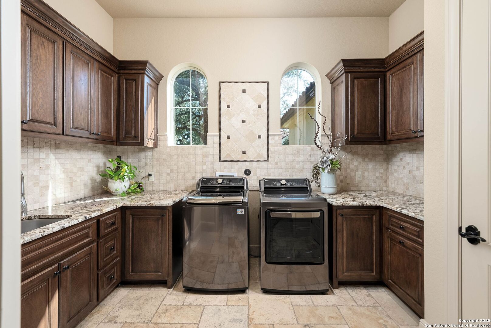 631 Menger Springs Boerne, TX 78006 - Photo 20 of 54 a kitchen with stainless steel appliances granite countertop a stove a sink and a microwave