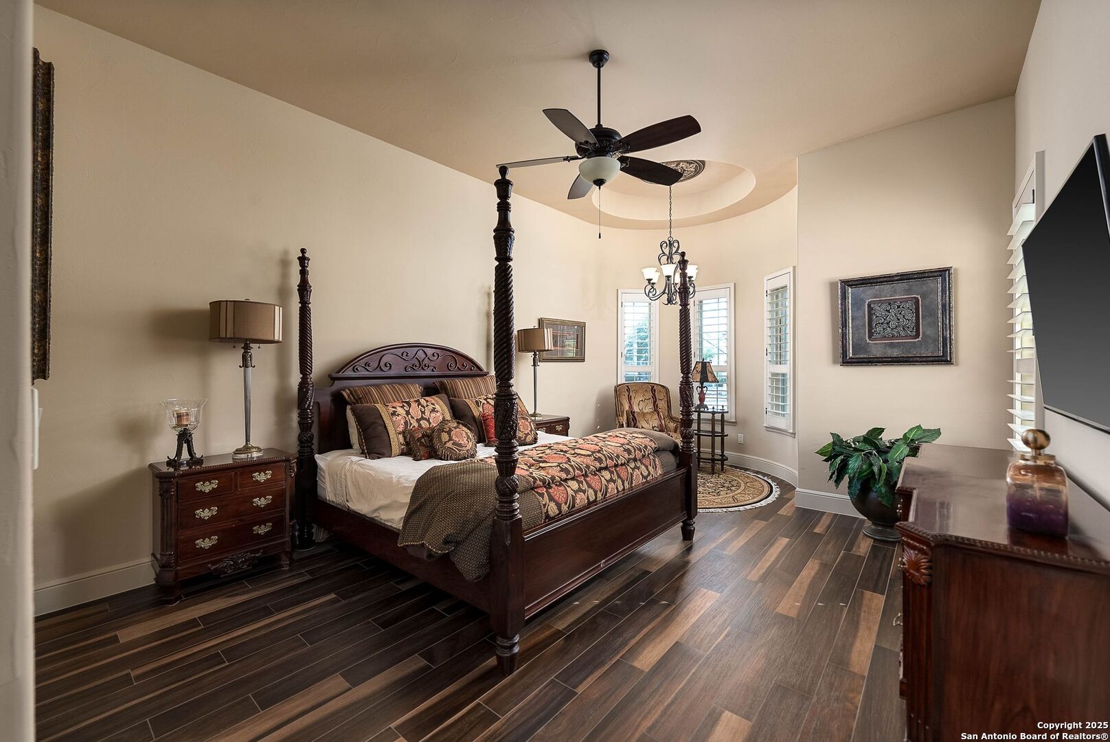 631 Menger Springs Boerne, TX 78006 - Photo 22 of 54 a bedroom with bed and a chandelier