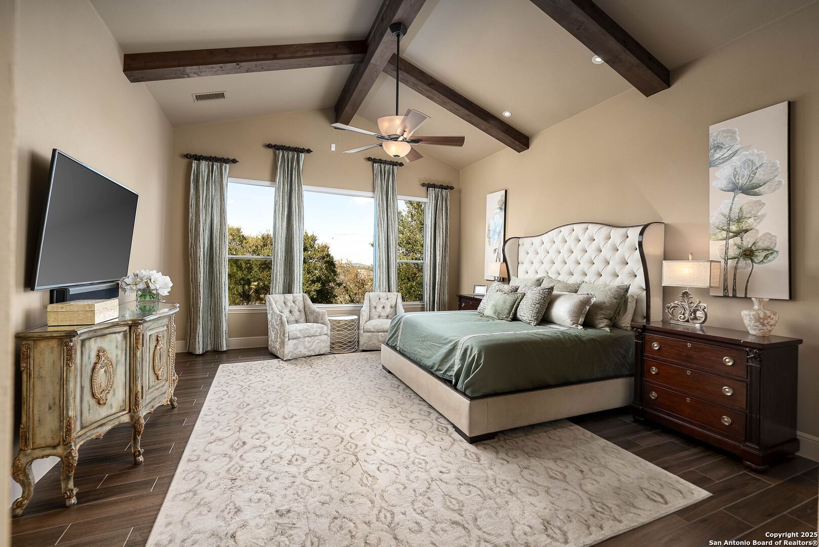 631 Menger Springs Boerne, TX 78006 - Photo 26 of 54 a living room with furniture and a flat screen tv