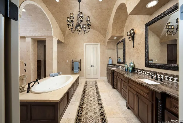 a bathroom with a window and a shower