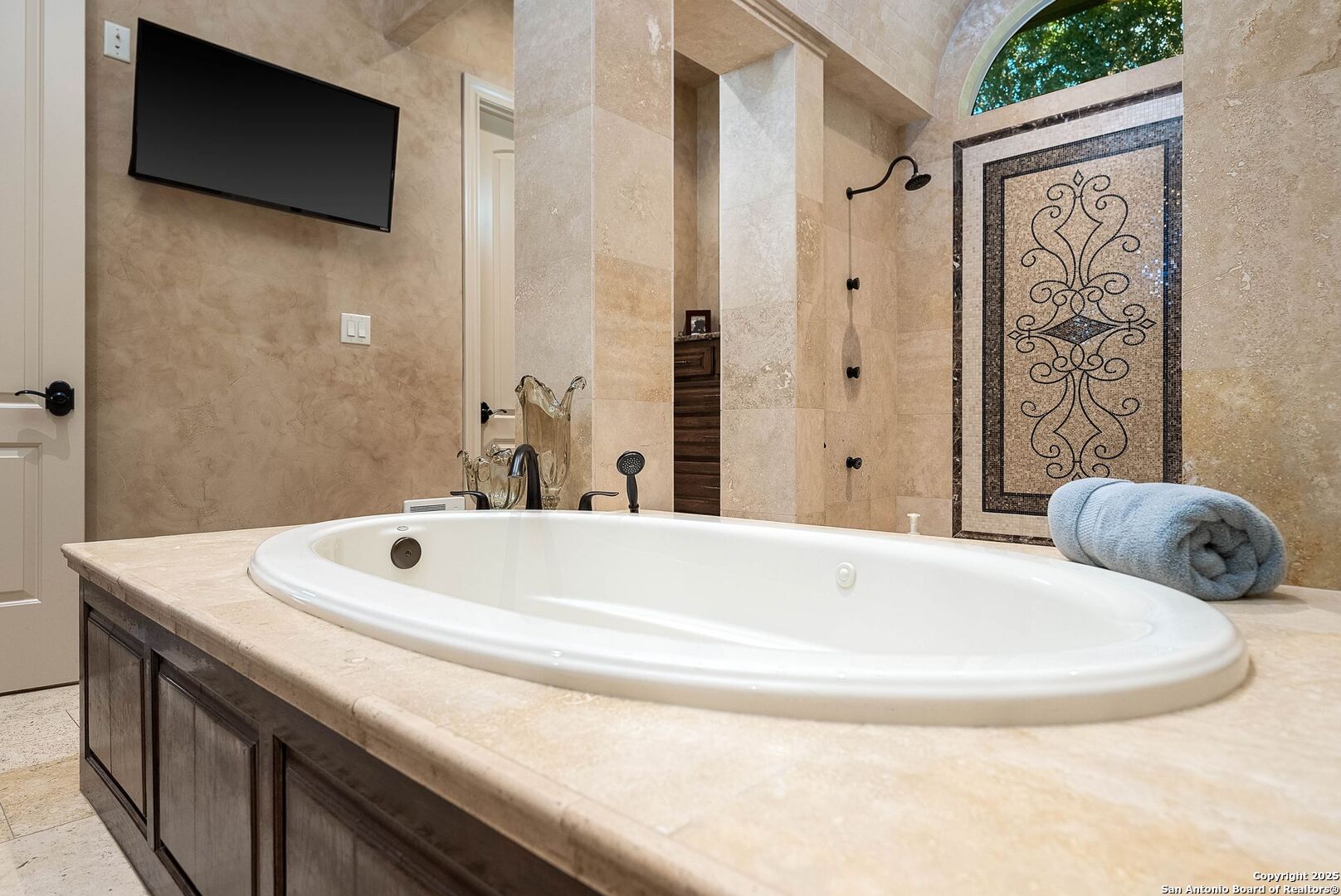 631 Menger Springs Boerne, TX 78006 - Photo 32 of 54 a bathroom with a tub sink and mirror