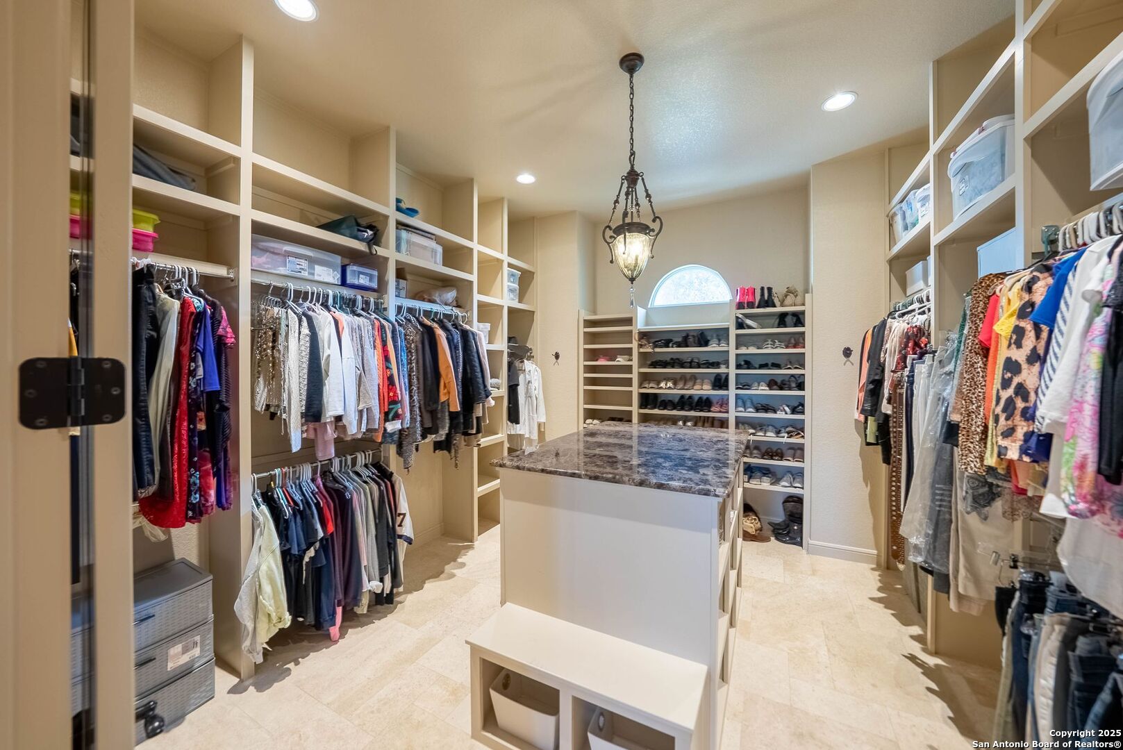 631 Menger Springs Boerne, TX 78006 - Photo 33 of 54 a view of walk in closet with clothes and shoes