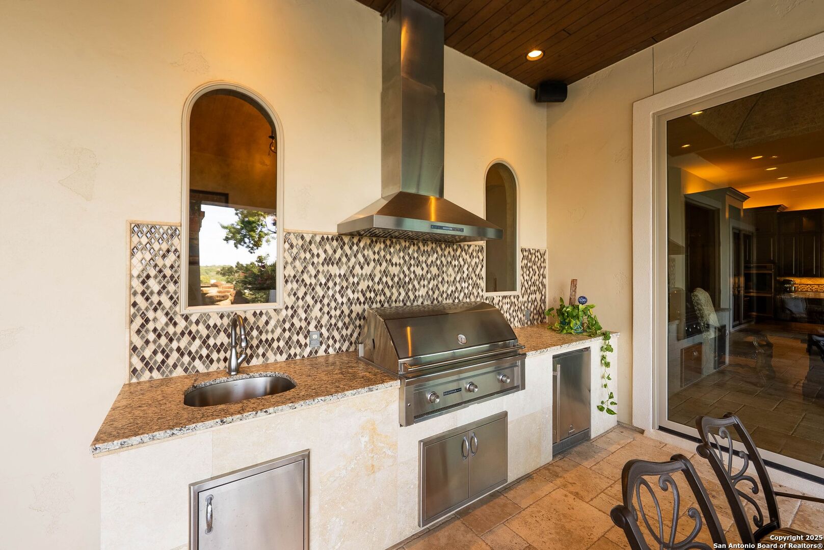 631 Menger Springs Boerne, TX 78006 - Photo 37 of 54 a kitchen with a sink and a stove top oven