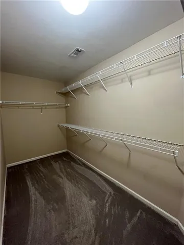 a view of a room with racks on the wall
