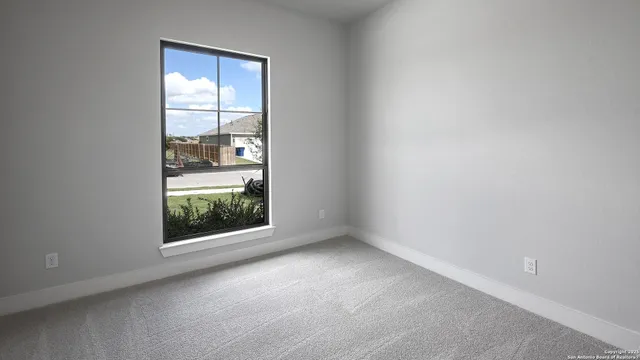 an empty room with a window