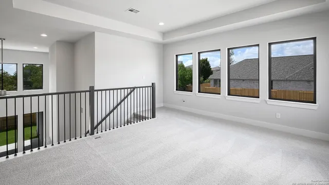 a view of a building stairs and an empty room