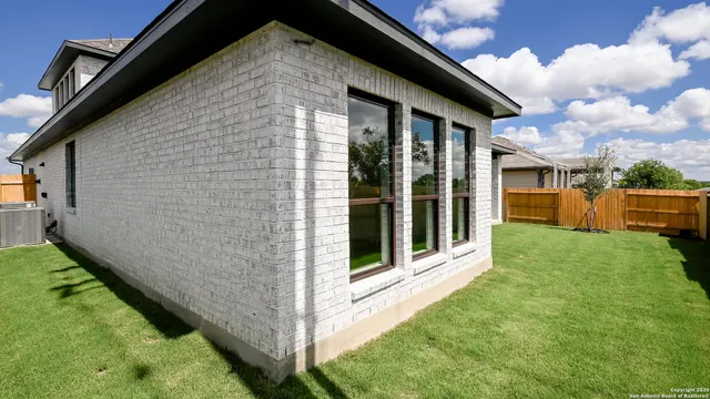 a view of a porch with a backyard