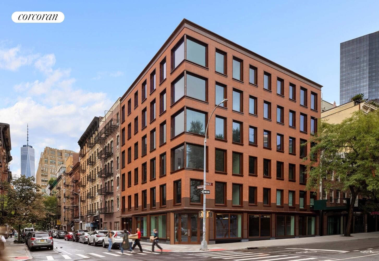 83 Thompson Street, Unit 4 Manhattan, NY 10012 - Photo 25 of 26 a view of a building with a street