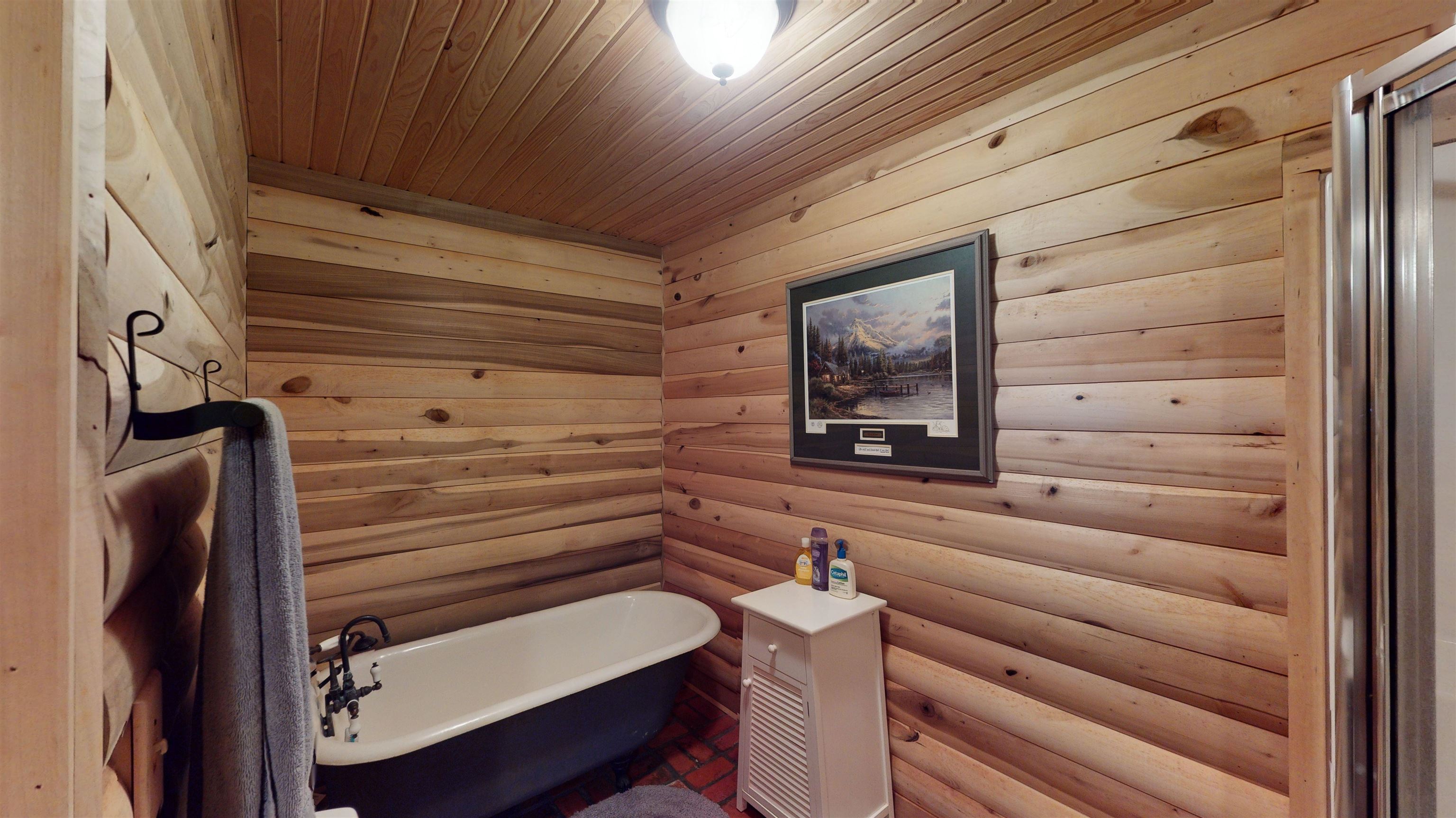 632 Mayflower Road Ramer, TN 38367 - Photo 11 of 25 a view of room with chair and wooden floor