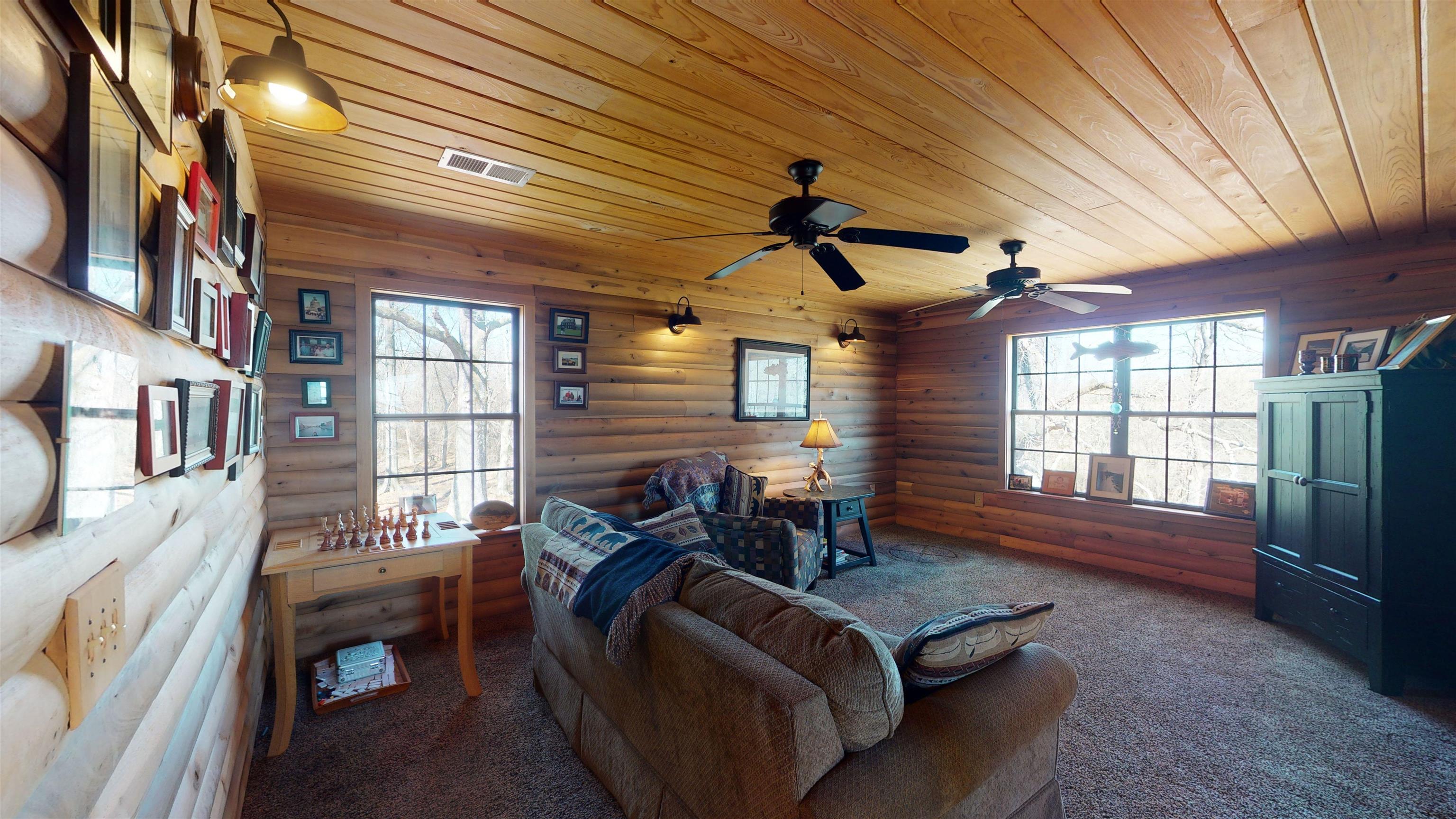 632 Mayflower Road Ramer, TN 38367 - Photo 16 of 25 a living room with furniture and a window