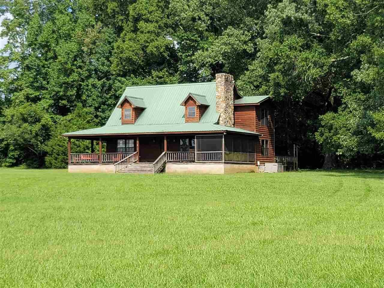 632 Mayflower Road Ramer, TN 38367 - Photo 2 of 25 a view of a back yard of the house