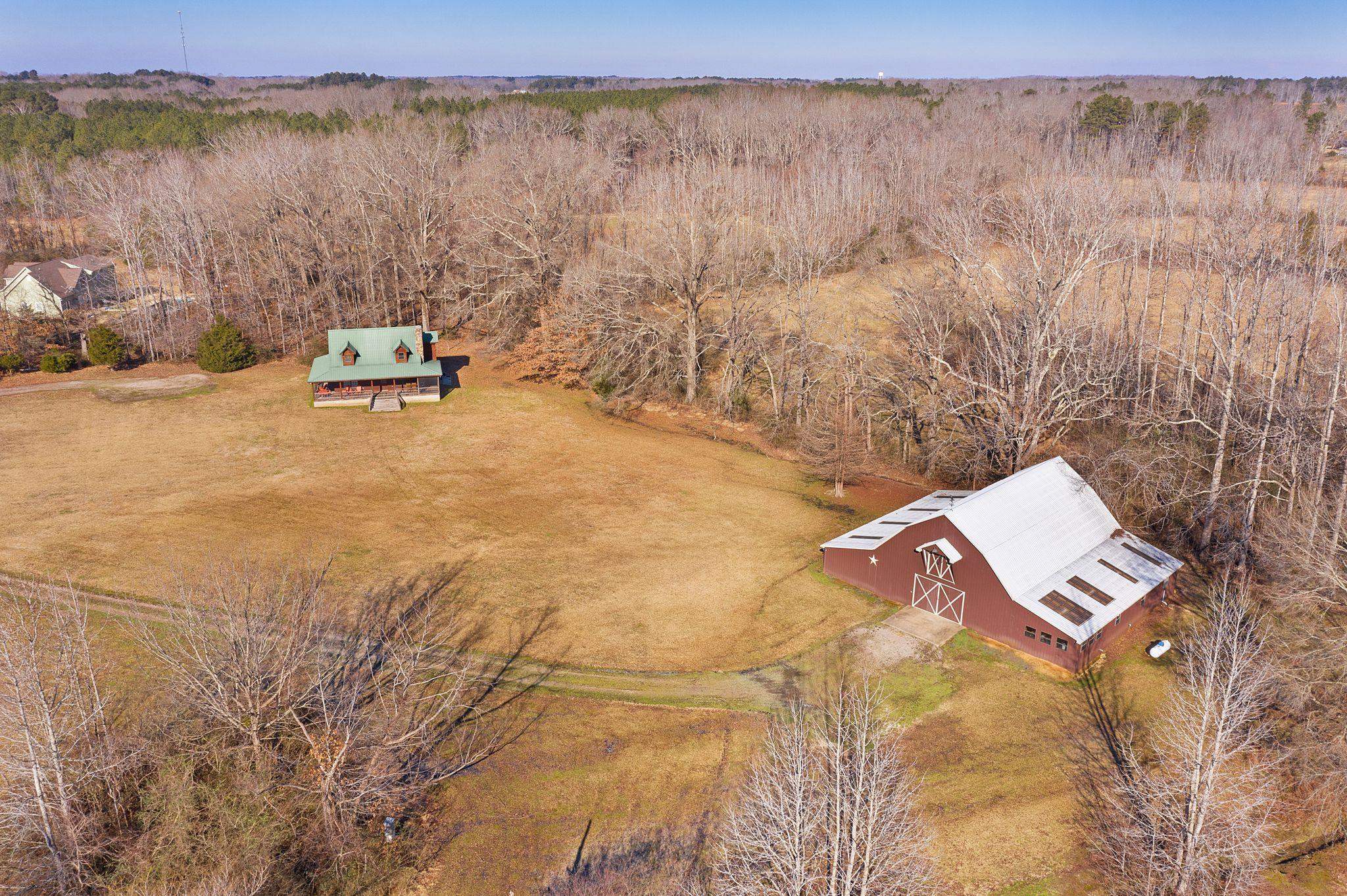 632 Mayflower Road Ramer, TN 38367 - Photo 25 of 25 a view of a lake with a mountain in the back