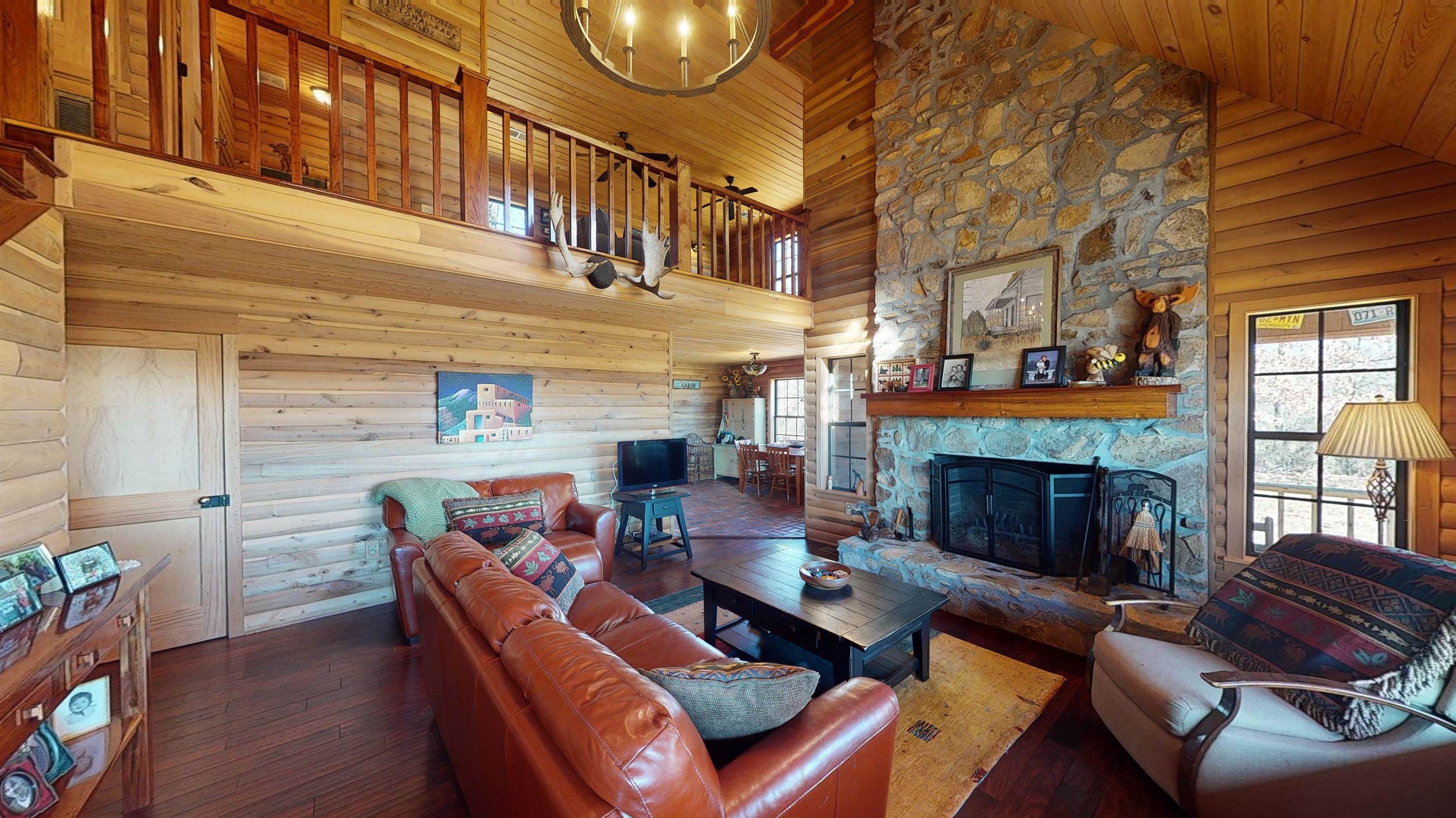 632 Mayflower Road Ramer, TN 38367 - Photo 3 of 25 a living room with furniture fireplace and a fireplace