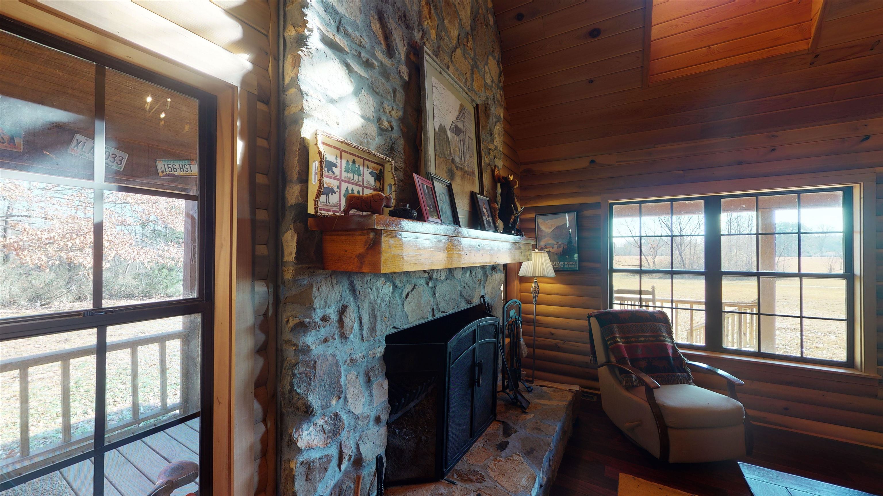 632 Mayflower Road Ramer, TN 38367 - Photo 8 of 25 a living room with furniture and a fireplace
