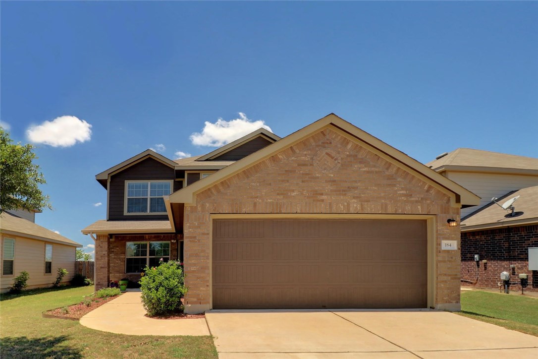 184 Housefinch Loop Leander, TX 78641 - Photo 1 of 1 Stately brick 2 story home in Leander, you'll love the covered front porch!