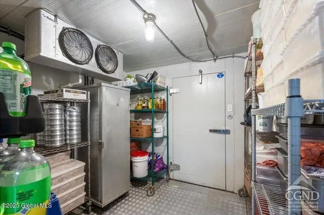 a picture of a table and chairs in the patio