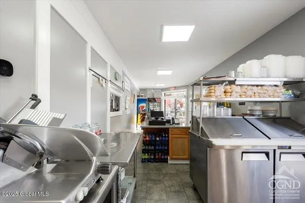 a room with lots of furniture and appliances