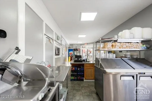 a room with lots of furniture and appliances