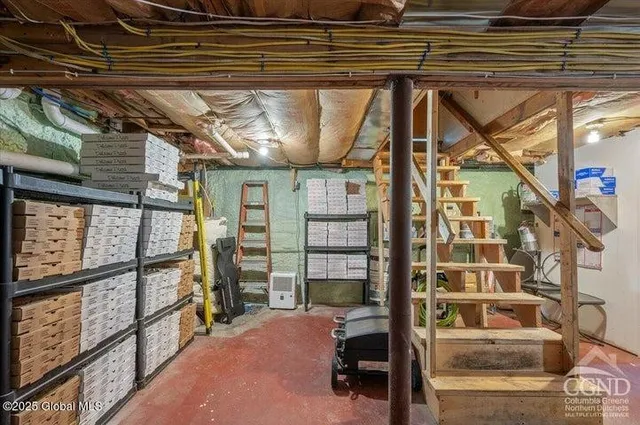 a bathroom with a sink toilet and mirror