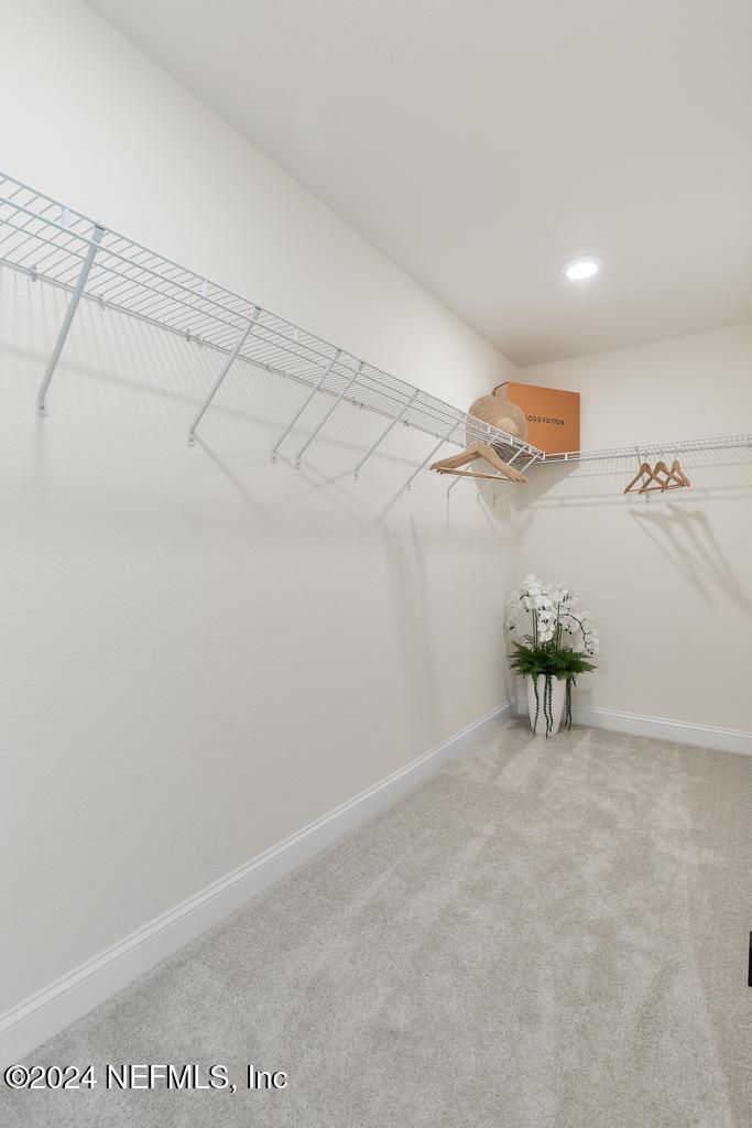 185 Clifton Bay Loop St. Johns, FL 32259 - Photo 38 of 92 a view of a room with racks on the wall