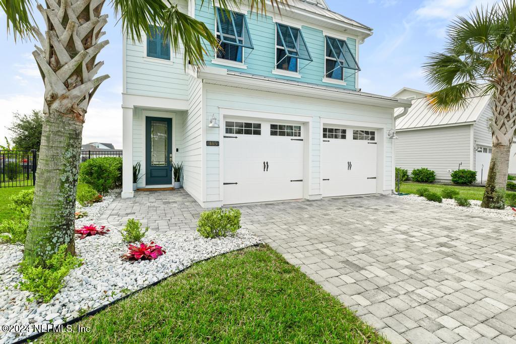 185 Clifton Bay Loop St. Johns, FL 32259 - Photo 4 of 92 a front view of a house with a yard