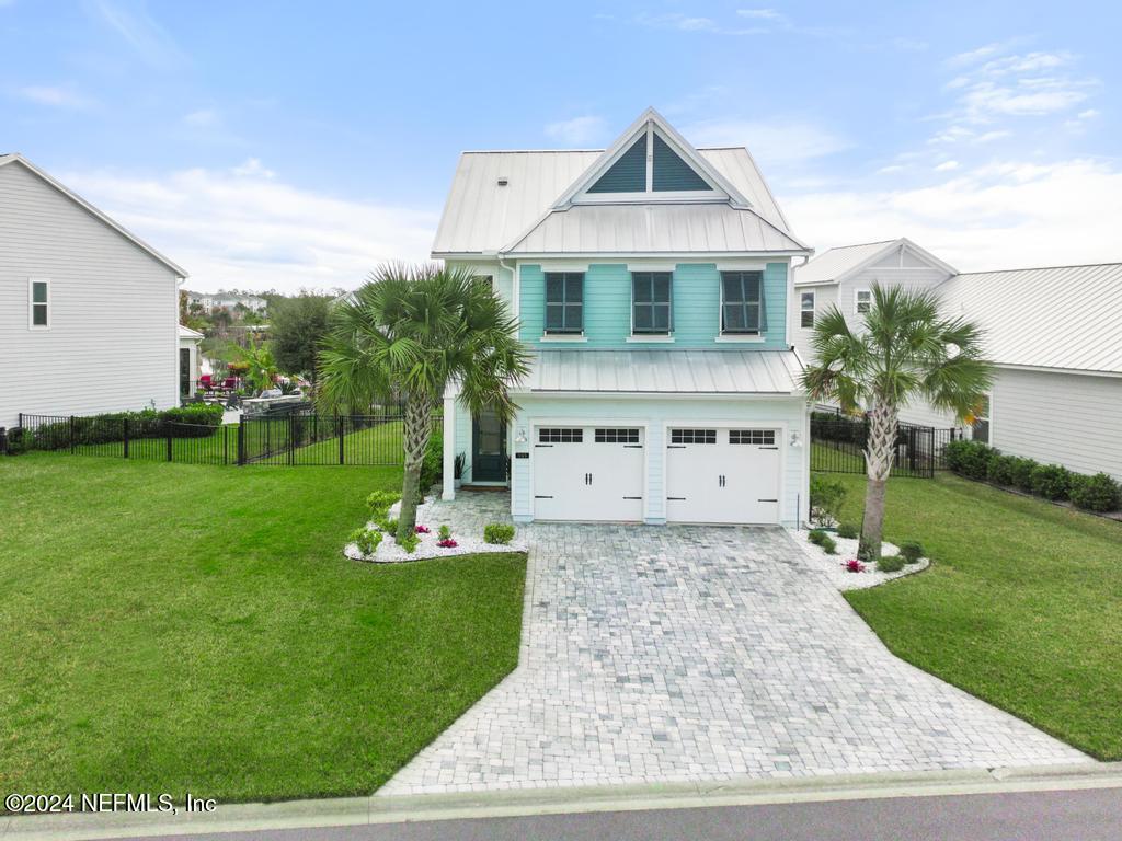 185 Clifton Bay Loop St. Johns, FL 32259 - Photo 63 of 92 a front view of a house with a yard