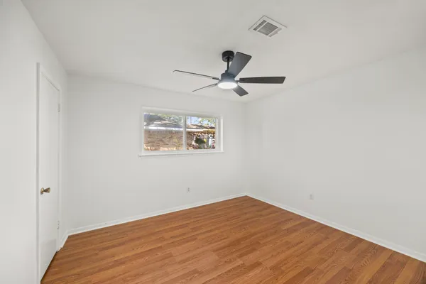 a view of a big room with wooden floor