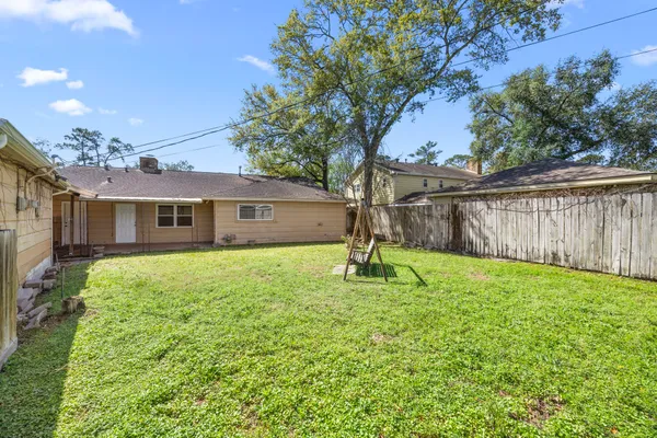 a house view with a garden space