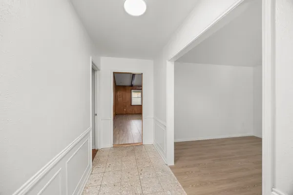 a view of an empty room and window