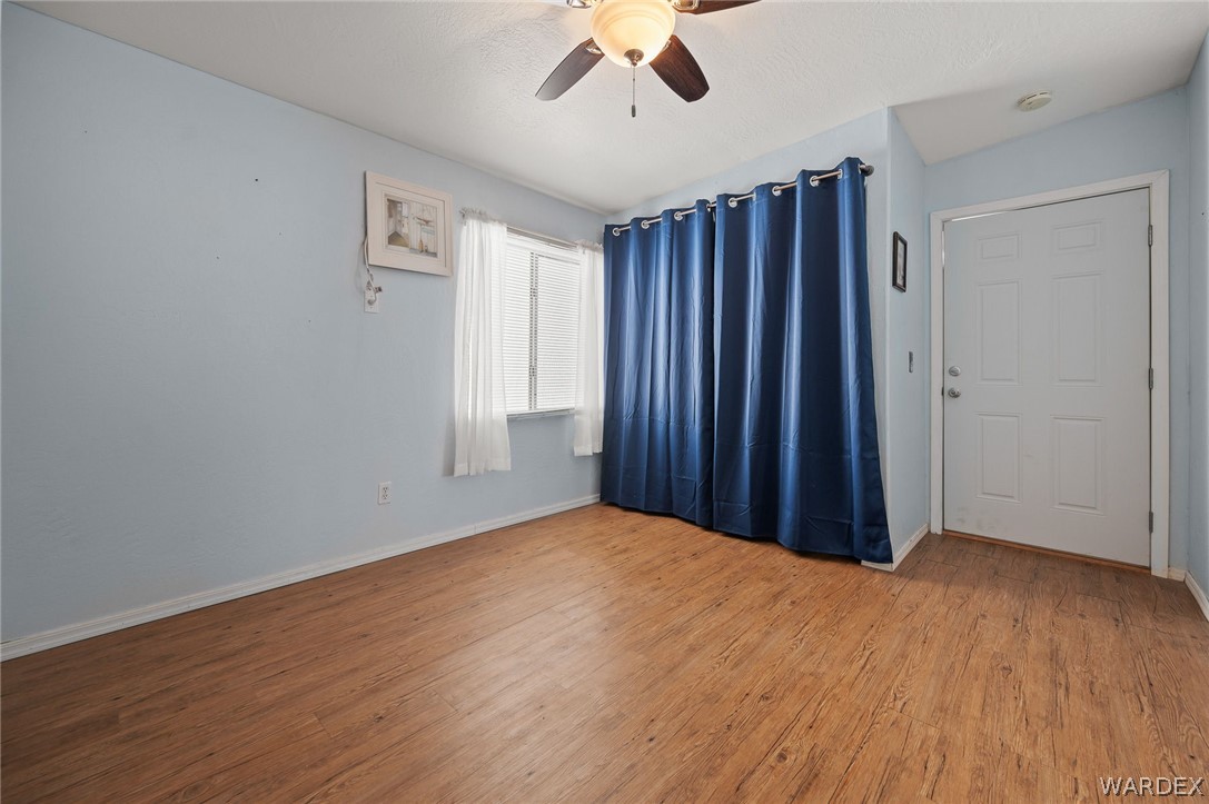 2000 Ramar Road, Unit 249 Bullhead City, AZ 86442 - Photo 16 of 40 Spacious bedroom layout with closet access and climate-controlled comfort.
