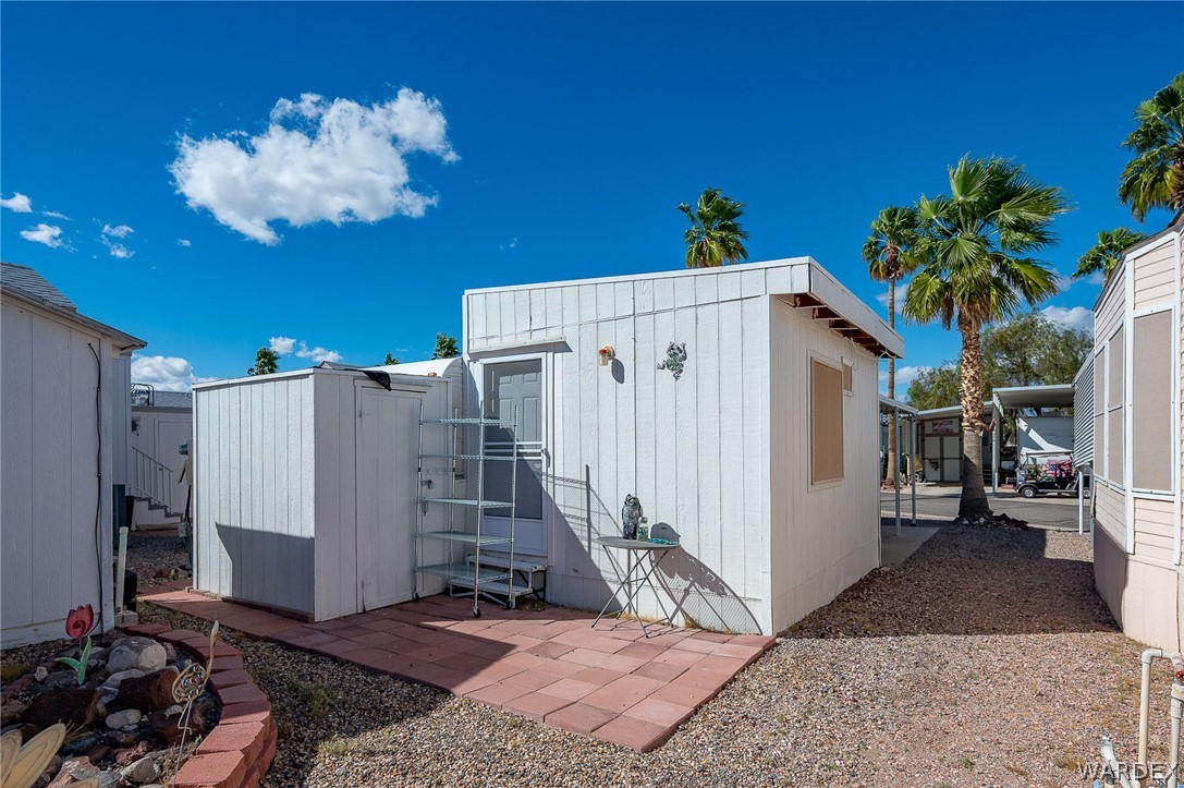 2000 Ramar Road, Unit 249 Bullhead City, AZ 86442 - Photo 18 of 40 Rear entry with patio space and additional storage ? room to improve and customize.