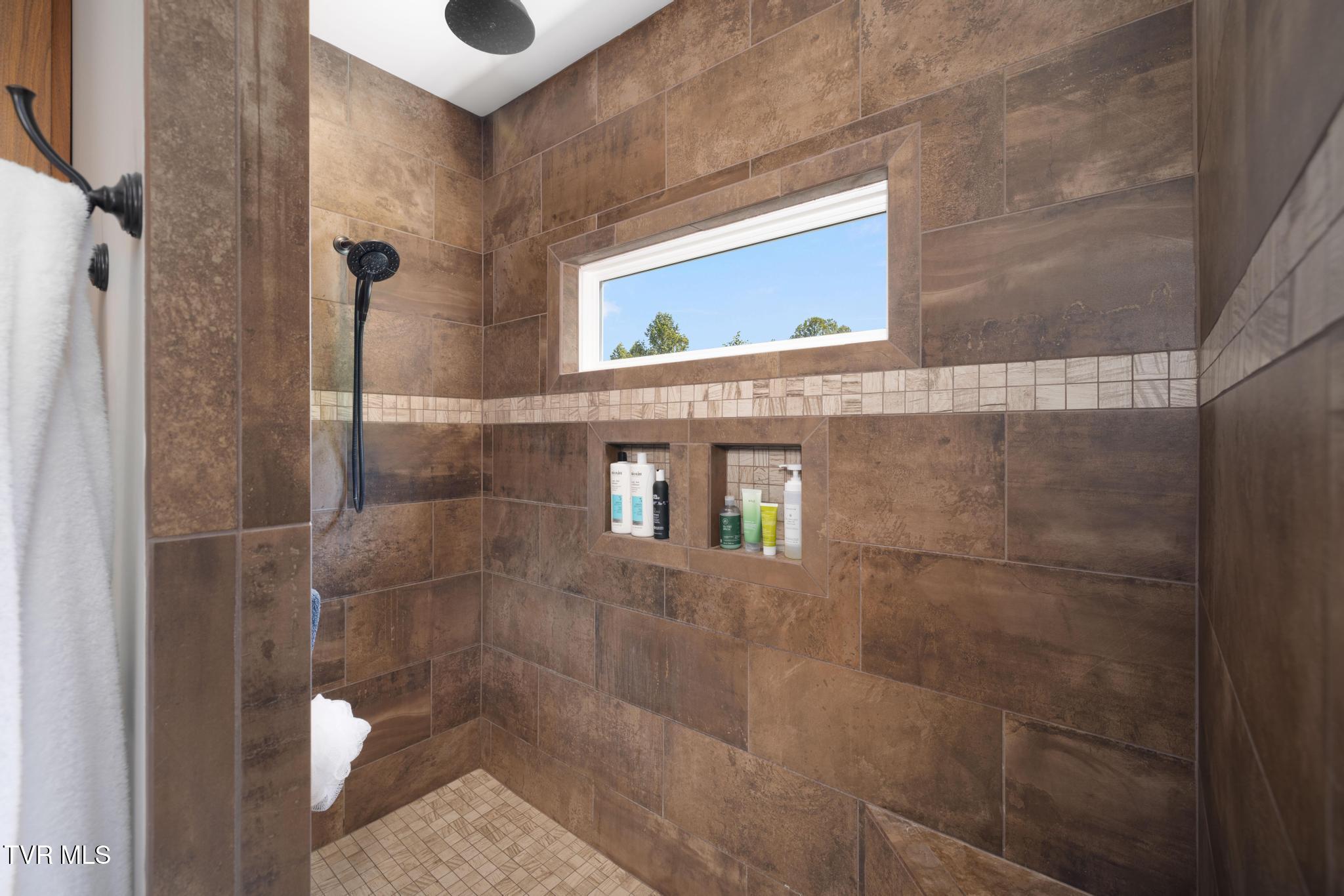 179 Taylortown Road Johnson City, TN 37601 - Photo 37 of 61 Tile shower in primary bathroom