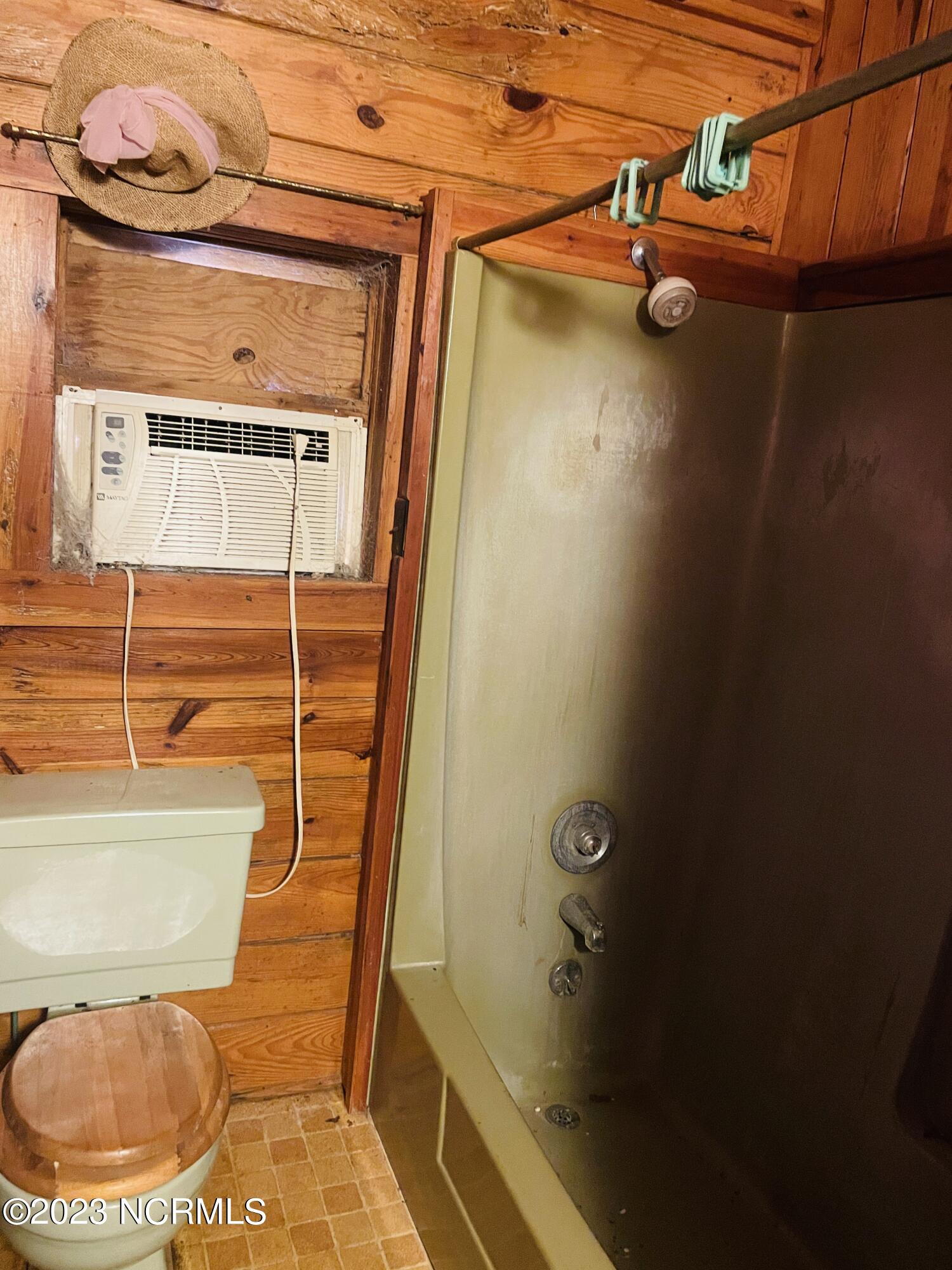6185 Rough And Ready Road Chadbourn, NC 28431 - Photo 68 of 78 This master bathroom includes tub/shower combo and toliet.