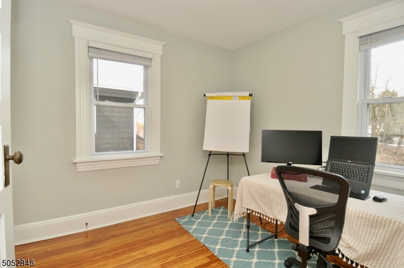 44 Dunnell Road Maplewood, NJ 07040 - Photo 13 of 18 a workspace with furniture and a window