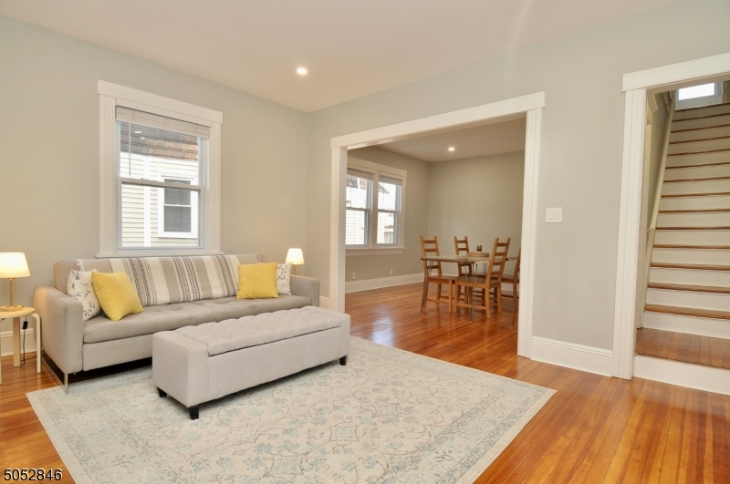 44 Dunnell Road Maplewood, NJ 07040 - Photo 3 of 18 a living room with furniture and a wooden floor