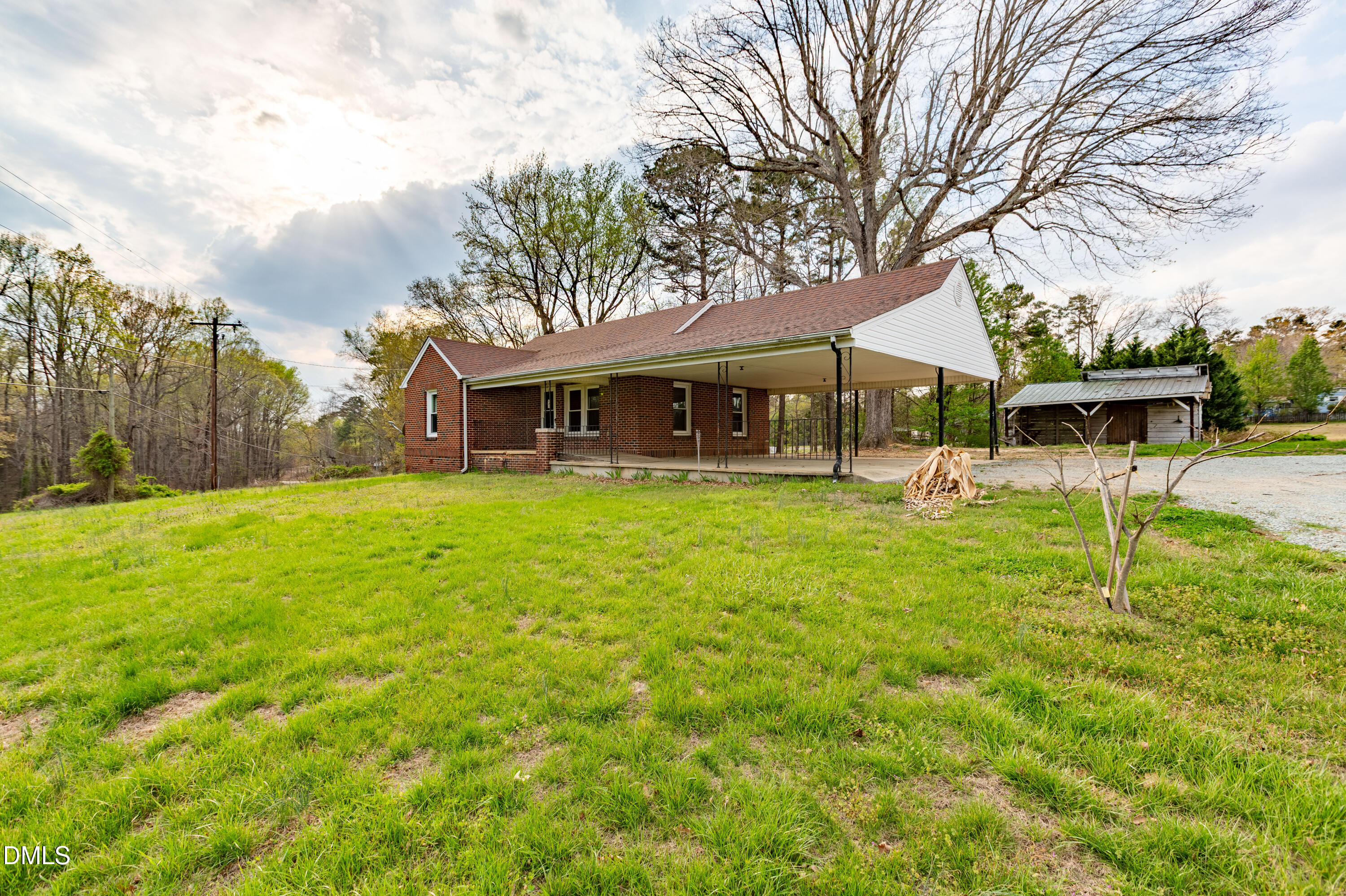 4295 Virgilina Road Roxboro, NC 27574 - Photo 28 of 46 a view of a house with a big yard