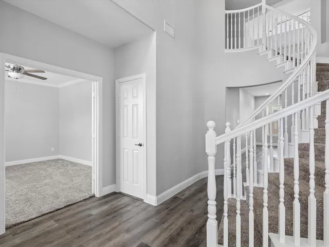 a view of entryway with wooden floor