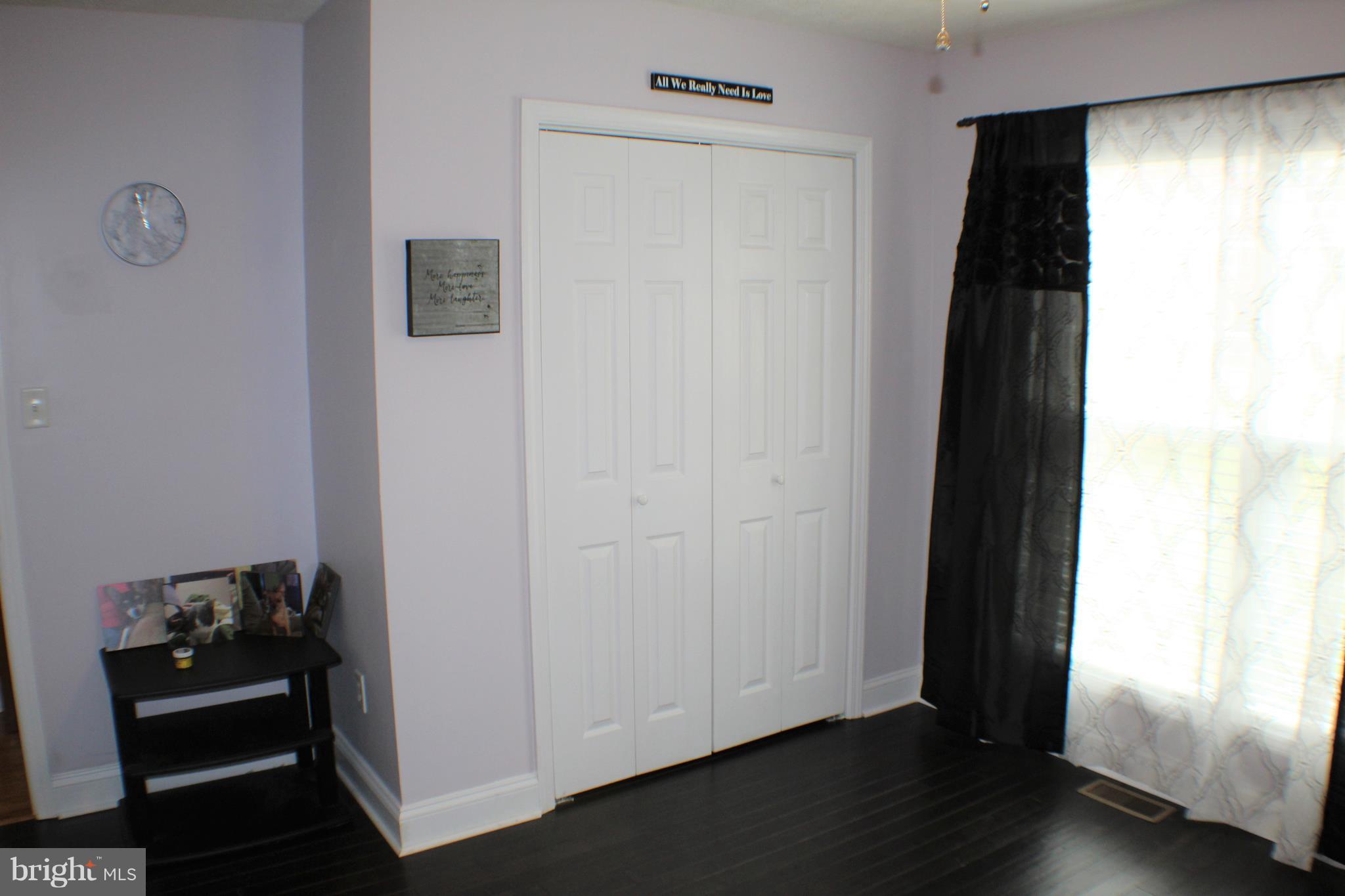 3307 Cabin Road Reva, VA 22735 - Photo 19 of 30 a view of a closet area with wooden floor