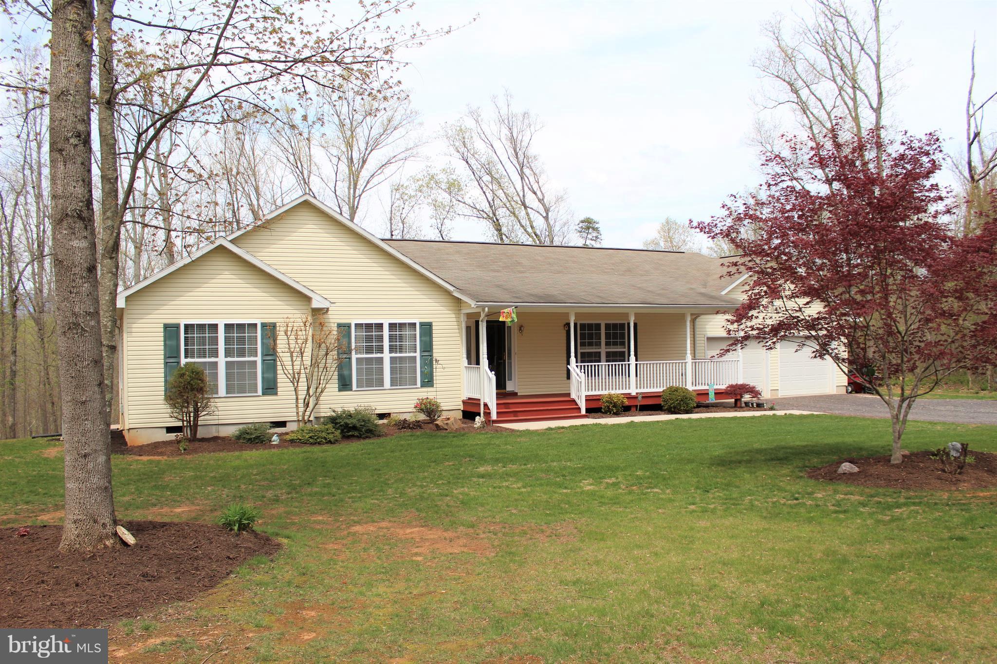 3307 Cabin Road Reva, VA 22735 - Photo 3 of 30 a front view of a house with a yard and trees