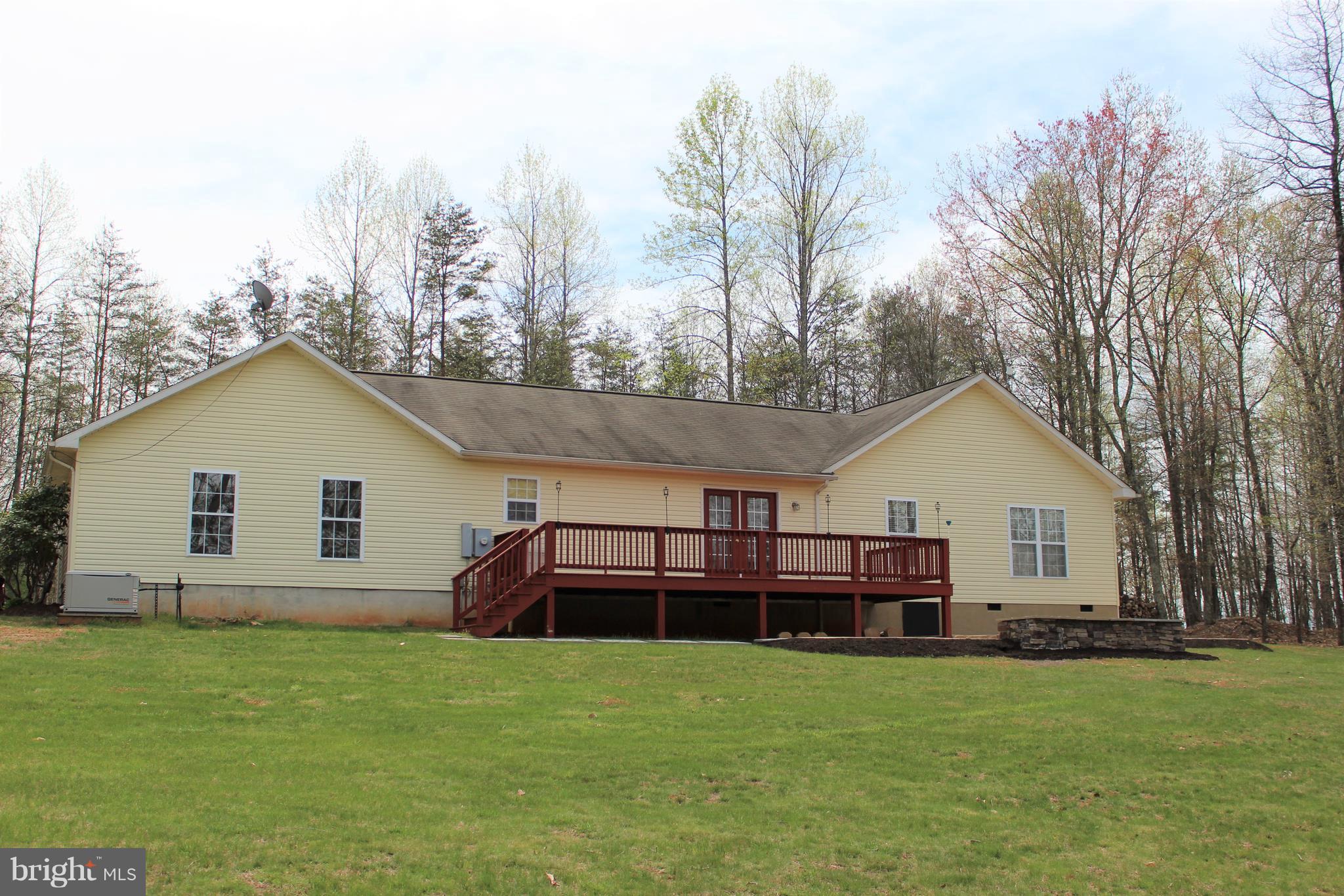 3307 Cabin Road Reva, VA 22735 - Photo 24 of 30 a view of a yard in front of a house with large trees